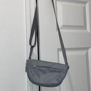 Lululemon small light gray festival bag. Excellent condition.